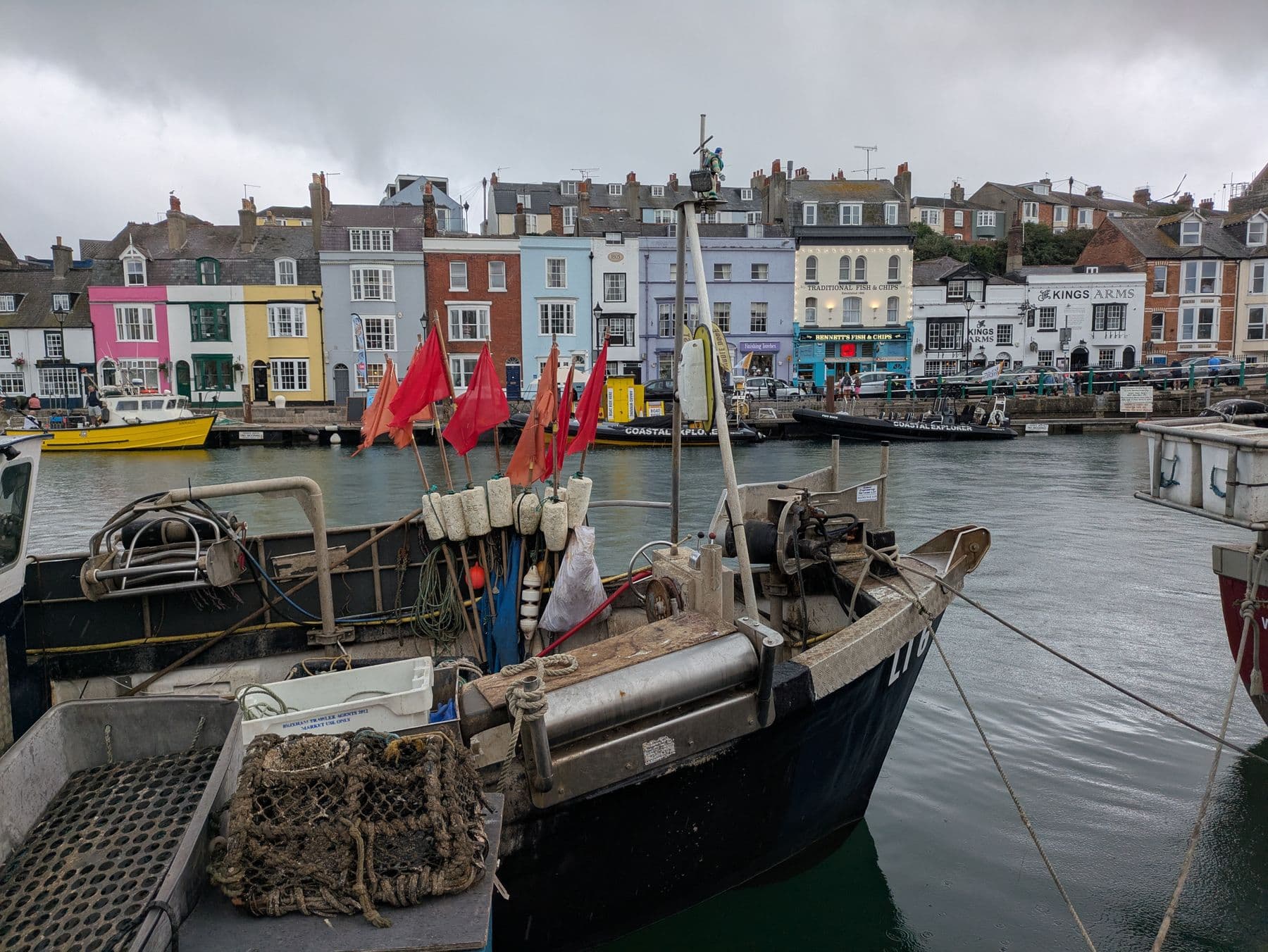 A working harbour in Cornwall, where Down The Cove began